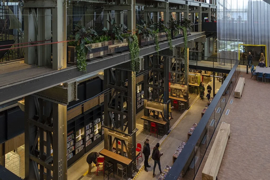 Lochal the library in Tilburg housed in a former locomotive factory. Right next to the train station in tilburg in brabant so easy to discover. 